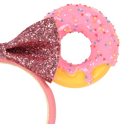 Donut-shaped headband with a glittery bow featuring Minnie Mouse ear.