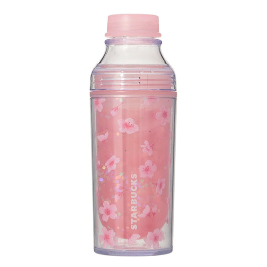 Starbucks Japan SAKURA Shine Brightly 2026 collection merchandise. Limited edition series featuring glitter pink stainless bottles, Stanley collaboration tumblers in pink gradient, and color-changing cups. The design theme highlights vivid spring colors, metallic gold accents, and bright cherry blossom patterns.