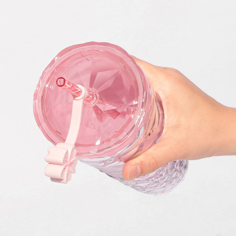 Starbucks Japan SAKURA Shine Brightly 2026 collection merchandise. Limited edition series featuring glitter pink stainless bottles, Stanley collaboration tumblers in pink gradient, and color-changing cups. The design theme highlights vivid spring colors, metallic gold accents, and bright cherry blossom patterns.