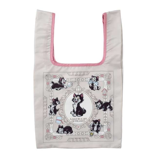 Disney Store Japan Figaro Eco Bag set. A reusable shopping bag that folds into a plush drawstring pouch shaped like Figaro's head. Features a black and white cat design with Cleo the goldfish details.