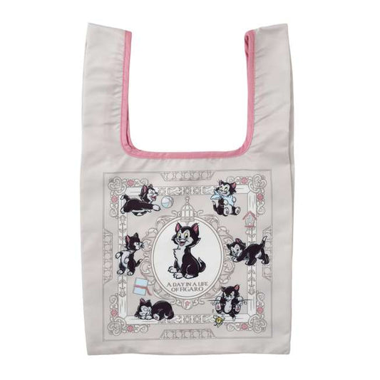 Disney Store Japan Figaro Eco Bag set. A reusable shopping bag that folds into a plush drawstring pouch shaped like Figaro's head. Features a black and white cat design with Cleo the goldfish details.