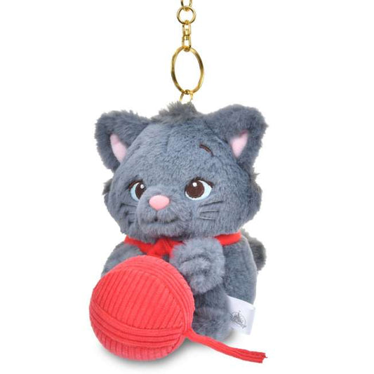 Marie, Toulouse and Berlioz plush keychains from the Disney Cat Day 2026 series. Fluffy stuffed animal keychains holding a yarn ball or mouse toy. These interactive plushies vibrate when the pull-string toy is pulled.