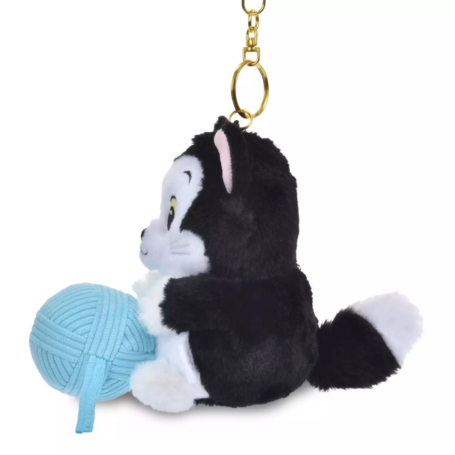 Lucifer and Figaro plush keychains from the Disney Cat Day 2026 series. Fluffy stuffed animal keychains holding a yarn ball or mouse toy. These interactive plushies vibrate when the pull-string toy is pulled.