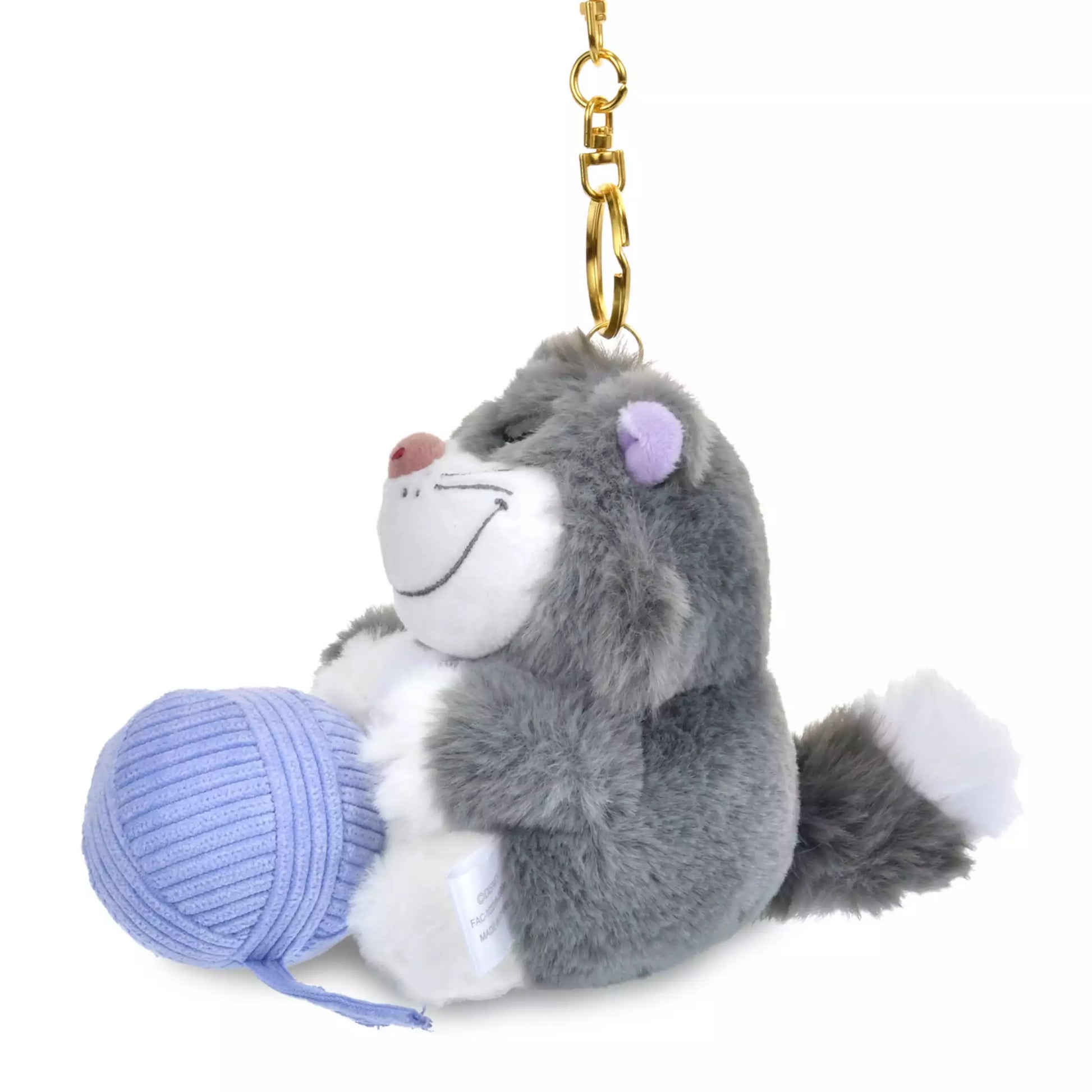 Lucifer and Figaro plush keychains from the Disney Cat Day 2026 series. Fluffy stuffed animal keychains holding a yarn ball or mouse toy. These interactive plushies vibrate when the pull-string toy is pulled.