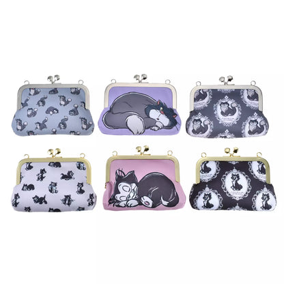 Disney Cat Day 2026 Secret Blind Box package. A mystery collectible item containing one of several Disney Cat characters like Lucifer, Figaro, or the Aristocats. The packaging features a vintage book illustration style.