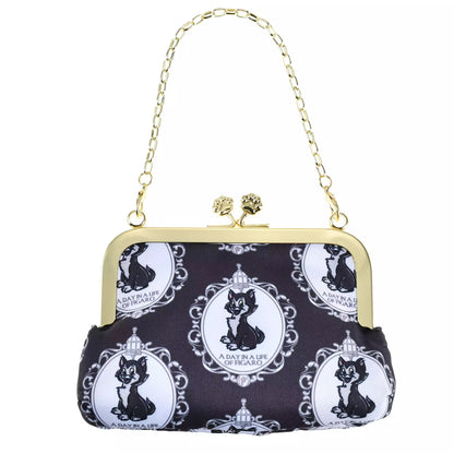 Disney Cat Day 2026 Secret Blind Box package. A mystery collectible item containing one of several Disney Cat characters like Lucifer, Figaro, or the Aristocats. The packaging features a vintage book illustration style.