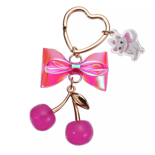 Keychain with pink bow, heart-shaped ring, cherry charm, and Marie Aristocats. Exclusive from Disney Store Japan.