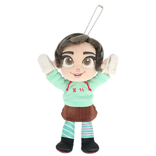 Shoulder plush toy of Vanellope with brown hair, green hoodie, and striped pants.