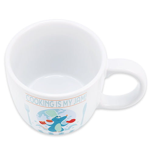 A mug featuring Chef Remy from the 'Food & Wine Festival 2026' collection. The design includes motifs of cheese, grapes, and wine, perfect for making your dining table lively as described in the festival theme.