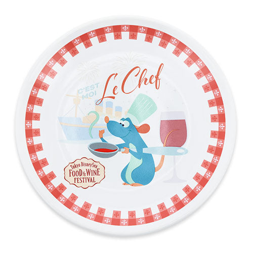 A plate featuring Chef Remy from the 'Food & Wine Festival 2026' collection. The design includes motifs of cheese, grapes, and wine, perfect for making your dining table lively as described in the festival theme.